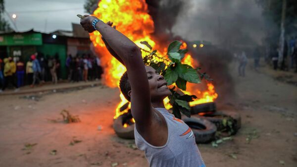 Сторонник лидера кенийской оппозиции Раила Одинги в Найроби, Кения - Sputnik International