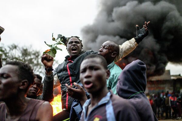 Сторонники кандидата в президенты Раилы Одинги протестуют против результатов всеобщих выборов в Кении в Кисуму - Sputnik International