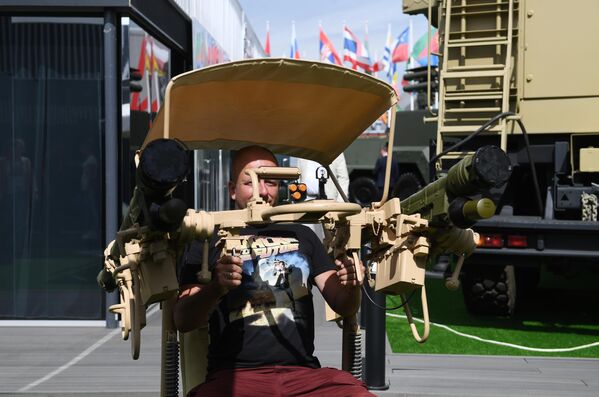 A visitor at the exhibition during the international military-technical forum Army-2022 at the Patriot Convention and Exhibition Center. - Sputnik International