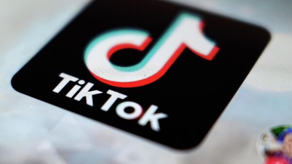 A logo of a smartphone app TikTok is seen on a user post on a smartphone screen Monday, Sept. 28, 2020, in Tokyo.  - Sputnik International
