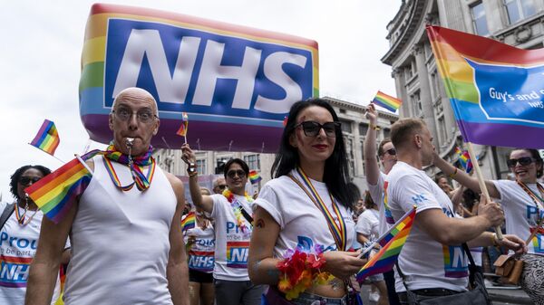 NHS workers from the Lesbian, Gay, Bisexual and Transgender (LGBT) community take part in the annual Pride Parade in London on July 6, 2019 - Sputnik International