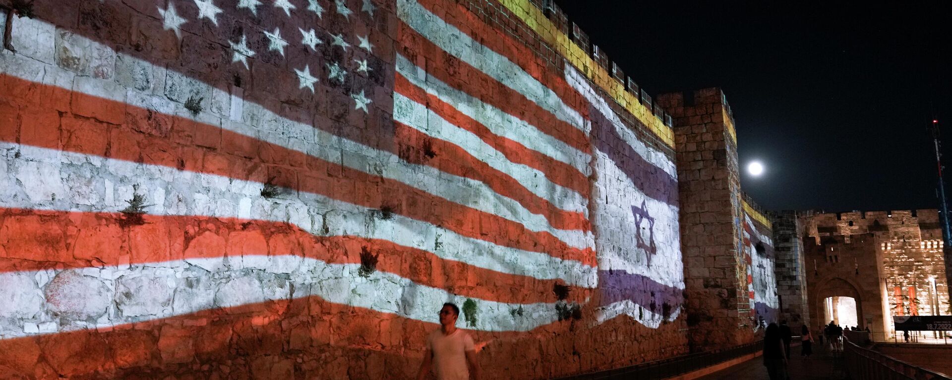 Image of the U.S. and Israeli flags is projected on the walls of Jerusalem's Old City in honor of President Joe Biden visit to Jerusalem, Wednesday, July 13, 2022. - Sputnik International, 1920, 21.08.2022