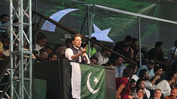 Pakistani opposition leader Imran Khan, center, addresses his party supporters during a rally to press government for fresh elections, in Lahore, Pakistan, Saturday, Aug. 13, 2022. - Sputnik International