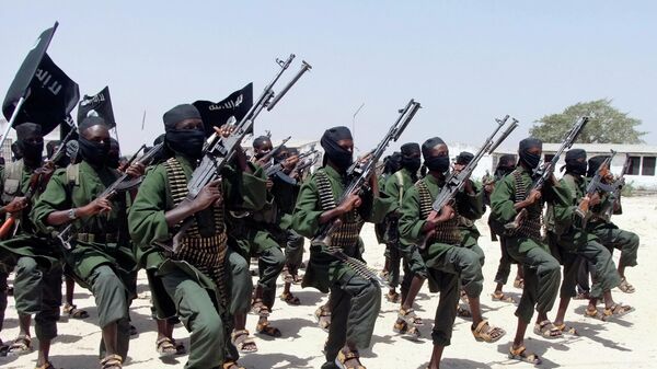 FILE---In this file photo of  Thursday, Feb.17, 2011, Hundreds of newly trained Shabaab fighters perform military exercises in the Lafofe area some 18 km south of Mogadishu, Somalia - Sputnik International