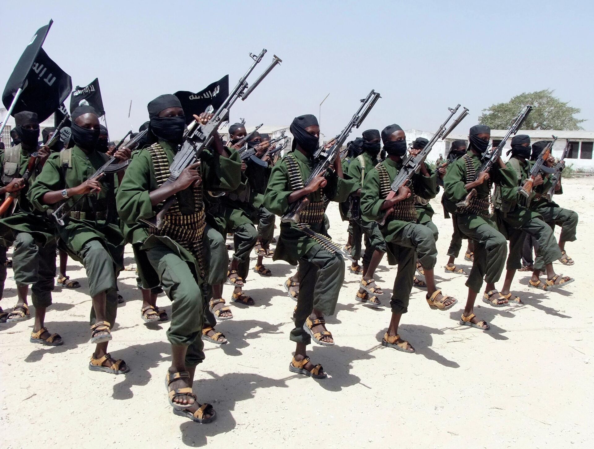 FILE---In this file photo of  Thursday, Feb.17, 2011, Hundreds of newly trained Shabaab fighters perform military exercises in the Lafofe area some 18 km south of Mogadishu, Somalia - Sputnik International, 1920, 26.08.2022