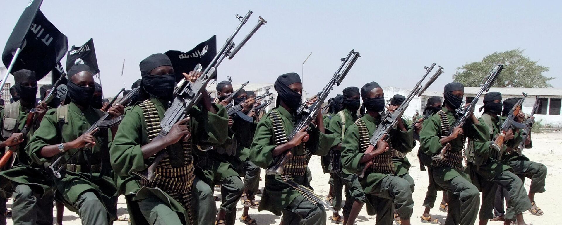FILE---In this file photo of  Thursday, Feb.17, 2011, Hundreds of newly trained Shabaab fighters perform military exercises in the Lafofe area some 18 km south of Mogadishu, Somalia - Sputnik International, 1920, 26.12.2022