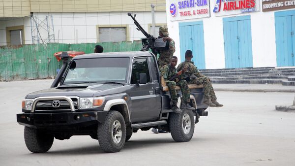 Soldiers patrol outside the Hayat Hotel in Mogadishu, Somalia, Saturday Aug, 20, 2022 - Sputnik International