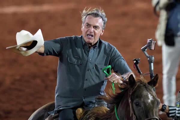 Brazilian President Jair Bolsonaro, who is running for a second term, rides a horse at the Barretos Rodeo International Festival in Barretos, Sao Paulo state, Brazil on Friday, Aug. 26, 2022. Brazil&#x27;s general elections are scheduled for Oct. 2, 2022. - Sputnik International
