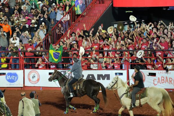 Jair Bolsonaro rides a horse at the Barretos Rodeo International Festival in Barretos, Sao Paulo state, Brazil on Friday, Aug. 26, 2022. - Sputnik International