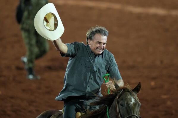 Brazilian President Jair Bolsonaro rides a horse at the Barretos Rodeo International Festival in Barretos, Sao Paulo state, Brazil on Friday, Aug. 26, 2022.  - Sputnik International