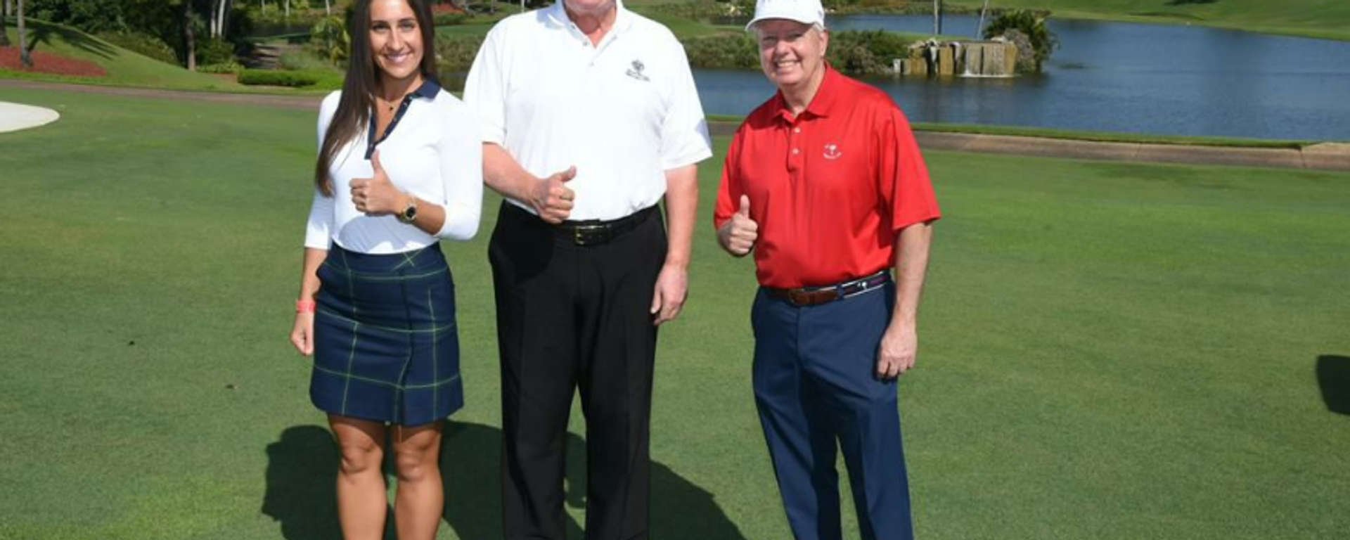 Inna Yashchyshyn poses with former President Donald Trump and Sen. Lindsey Graham, R-S.C., at Mr. Trump’s private golf course just miles from Mar-a-Lago in May 2021. - Sputnik International, 1920, 27.08.2022