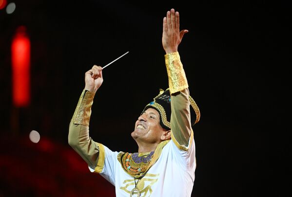 The conductor of the Egyptian Military Symphonic Band performs at the opening ceremony of the ‘Spasskaya Tower’ International Military Music Festival 2022. - Sputnik International