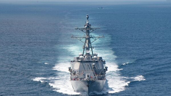In this handout image courtesy of the US Navy taken on August 27, 2021 the AI Arleigh-burke class guided-missile destroyer USS Kidd (DDG 100) transits the Taiwan Strait during a routine transit - Sputnik International