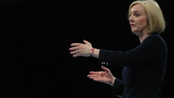 Contender to become the country's next Prime minister and leader of the Conservative party British Foreign Secretary Liz Truss reacts as she answers questions while taking part in a Conservative Party Hustings event in Birmingham, on August 23, 2022 - Sputnik International