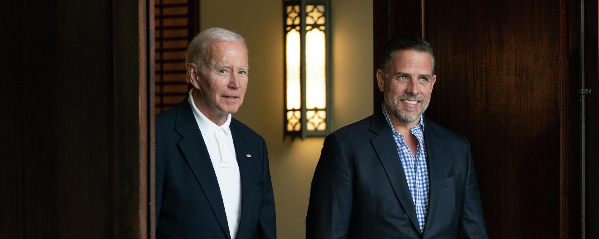 President Joe Biden and his son Hunter Biden leave Holy Spirit Catholic Church in Johns Island, S.C., after attending a Mass, Saturday, Aug. 13, 2022. - Sputnik International, 1920, 24.02.2023