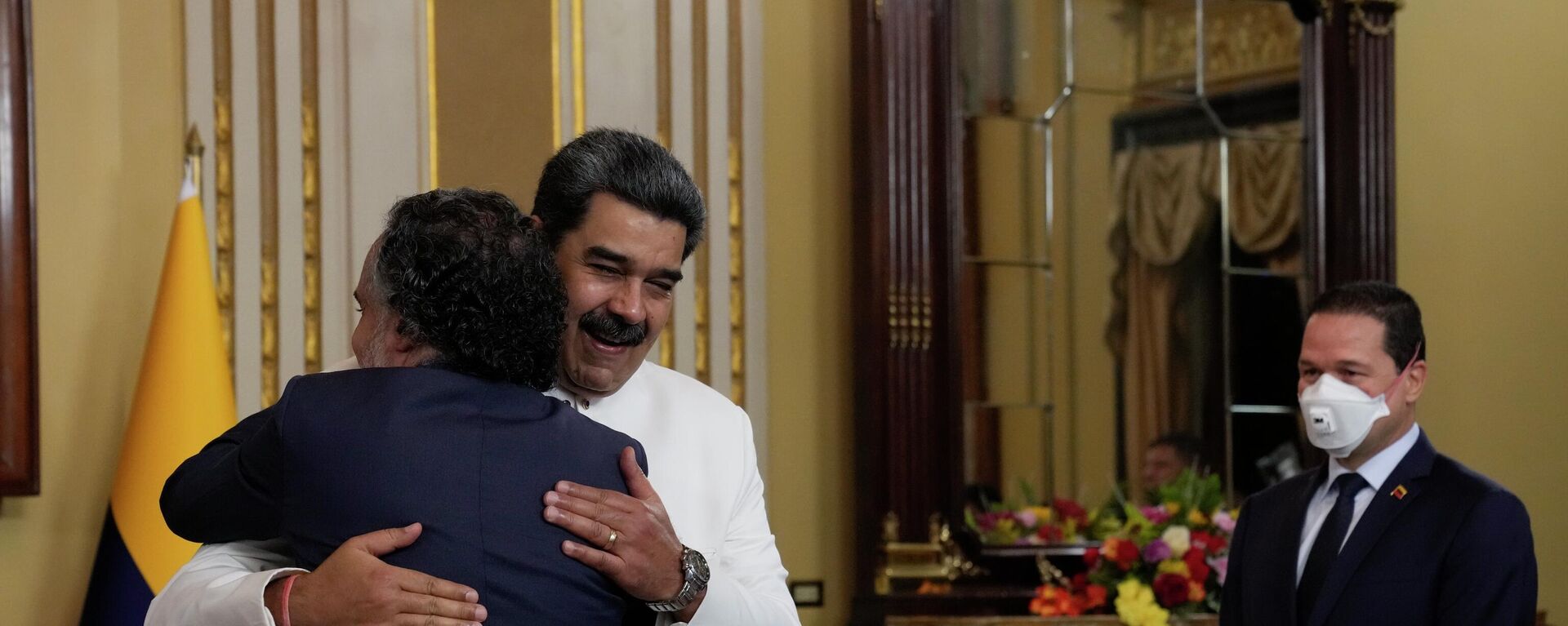 Venezuela's President Nicolas Maduro, in white, embraces Colombia's new ambassador Armando Benedetti as they meet at Miraflores Palace in Caracas, Venezuela, Monday, Aug 29, 2022.  - Sputnik International, 1920, 30.08.2022