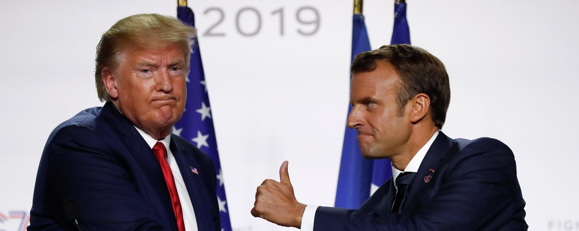 In this Aug. 26, 2019, file photo, French President Emmanuel Macron and U.S President Donald Trump shake hands during the final press conference during the G7 summit in Biarritz, southwestern France.  - Sputnik International, 1920, 30.08.2022