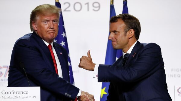 In this Aug. 26, 2019, file photo, French President Emmanuel Macron and U.S President Donald Trump shake hands during the final press conference during the G7 summit in Biarritz, southwestern France.  - Sputnik International