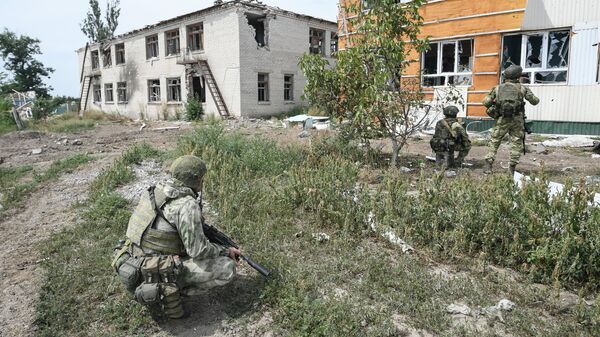 Russian forces take control of former kindergarten used by Ukrainian troops in the settlement of Alexandrovka, Kherson Region. August 15, 2022. - Sputnik International