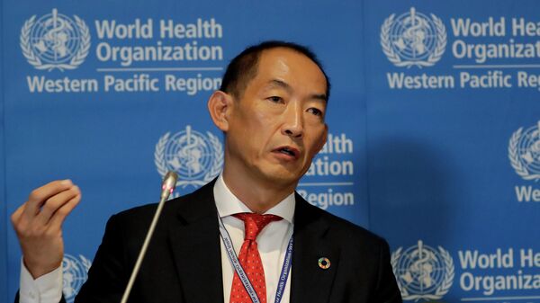 FILE – World Health Organization Regional Director for Western Pacific Takeshi Kasai addresses the media at the start of the five-day annual session Monday, Oct. 7, 2019, in Manila. - Sputnik International