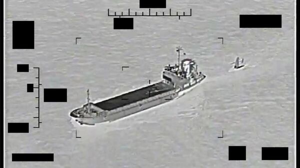  ARABIAN GULF (Aug. 30, 2022) Screenshot of a video showing support ship Shahid Baziar, left, from Iran's Islamic Revolutionary Guard Corps Navy unlawfully towing a Saildrone Explorer unmanned surface vessel in international waters of the Arabian Gulf, Aug. 30. (U.S. Navy photo)  - Sputnik International