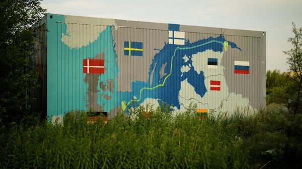 A painting showing the Nord Stream pipelines is displayed on a container near the Nord Stream 1 Baltic Sea pipeline in Lubmin, Germany, Wednesday, July 20, 2022 - Sputnik International