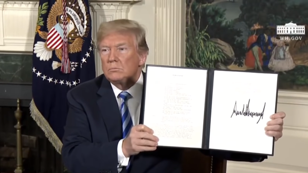 US President Donald Trump signs an order on May 8, 2018, unilaterally withdrawing the US from the 2015 Joint Comprehensive Plan of Action (JCPOA), also known as the 2015 Iran Nuclear Deal, on unsubstantiated accusations that Iran was secretly violating it and continuing nuclear bomb research. - Sputnik International