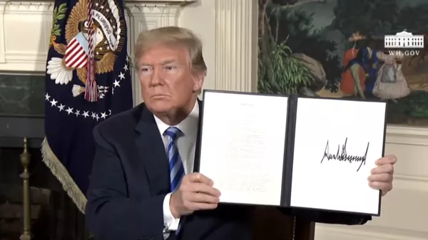 US President Donald Trump signs an order on May 8, 2018, unilaterally withdrawing the US from the 2015 Joint Comprehensive Plan of Action (JCPOA), also known as the 2015 Iran Nuclear Deal, on unsubstantiated accusations that Iran was secretly violating it and continuing nuclear bomb research. - Sputnik International