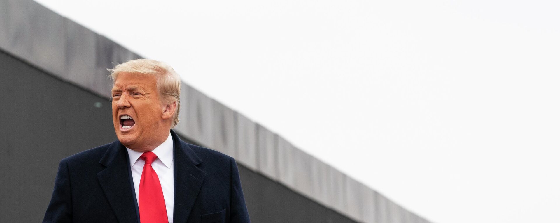 President Donald Trump reacts after speaking near a section of the U.S.-Mexico border wall, Tuesday, Jan. 12, 2021, in Alamo, Texas - Sputnik International, 1920, 15.11.2022