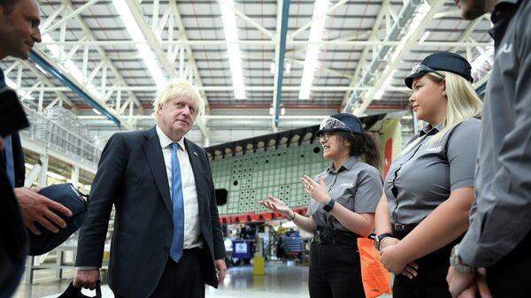 Britain's Prime Minister Boris Johnson meets apprentices during a visit to the Airbus UK East Factory in Broughton, North Wales - Sputnik International