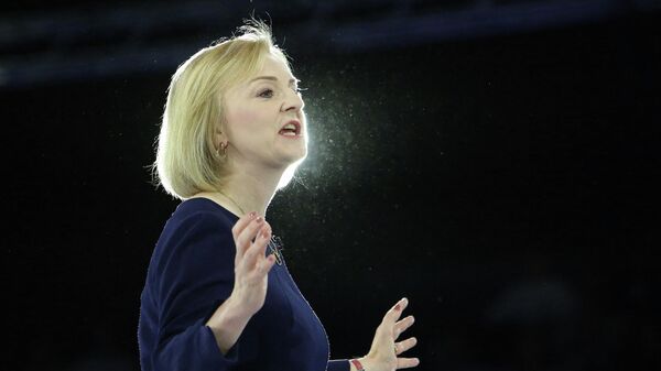 Liz Truss, Britain's Foreign Secretary and a contender to become the country's next Prime Minister and leader of the Conservative party, answers questions as she takes part in a Conservative Party Hustings event at Wembley Arena, in London, on August 31, 2022 - Sputnik International