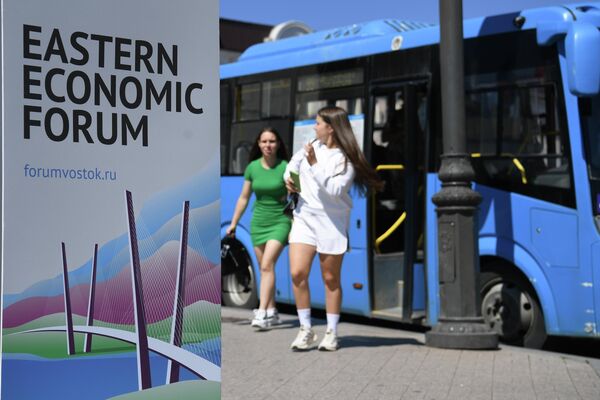 A banner featuring the logo of the Eastern Economic Forum in Vladivostok. - Sputnik International