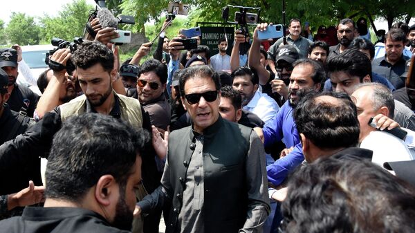 Former Pakistani Prime Minister Imran Khan, center, arrives to an anti-terrorism court in Islamabad, Pakistan, Thursday, Sept. 1, 2022 - Sputnik International