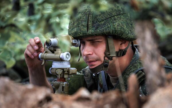 A serviceman at the 'Vostok 2022' military maneuvers at the Sergeevsky training ground - Sputnik International