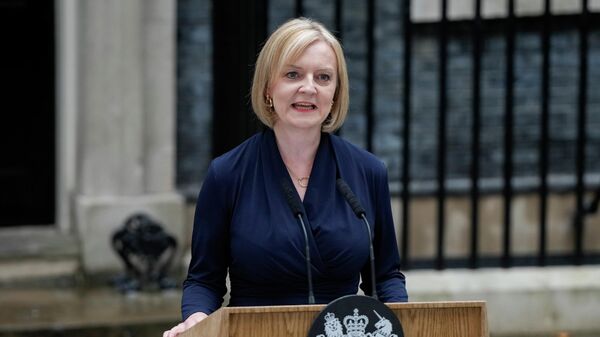 New British Prime Minister Liz Truss makes an address outside Downing Street in London, Tuesday, Sept. 6, 2022 after returning from Balmoral in Scotland where she was formally appointed by Britain's Queen Elizabeth II.  - Sputnik International