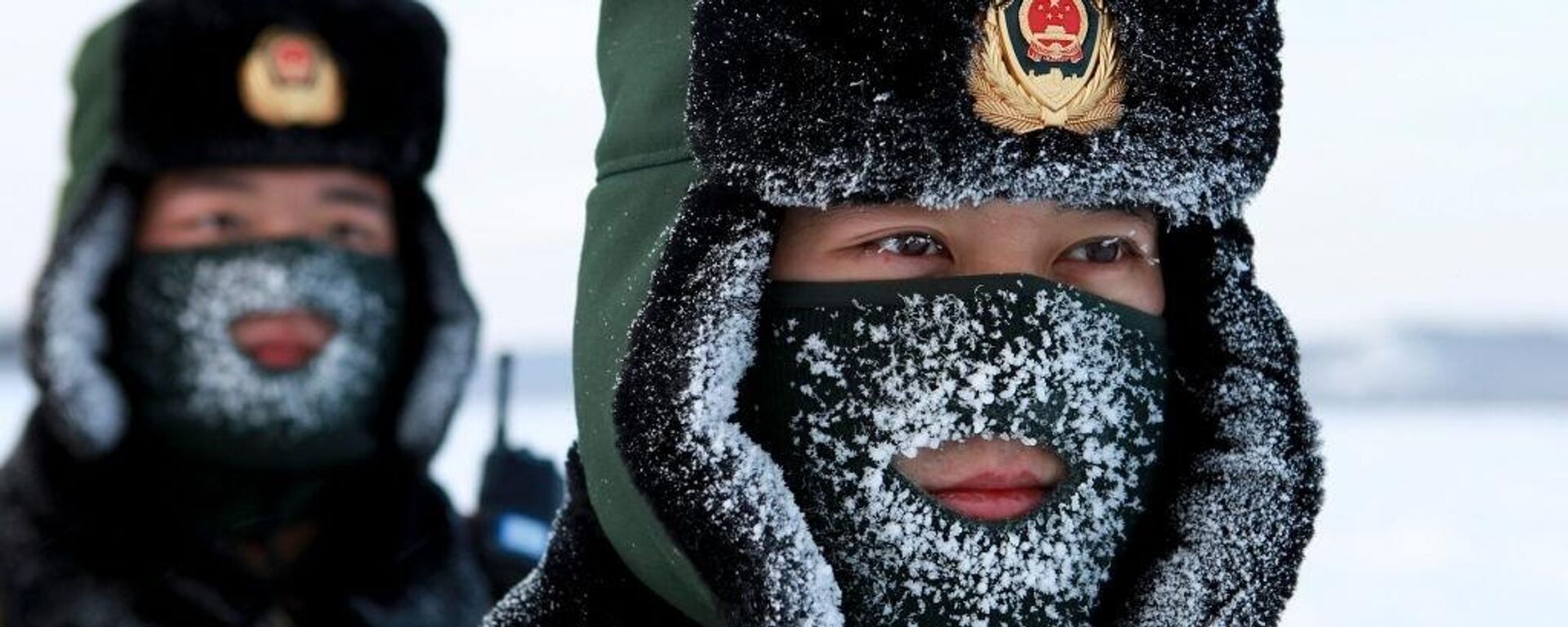 Chinese paramilitary police border guards train in the snow at Mohe County in China's northeast Heilongjiang province, on the border with Russia,  on December 12, 2016 - Sputnik International, 1920, 17.10.2022
