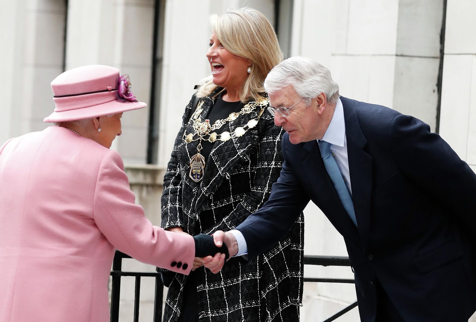 Britain's Queen Elizabeth II is greeted by former British Prime Minister John Major at Kings College in London, Tuesday, March 19, 2019. The Queen and Kate Duchess of Cambridge, will visit King's College London, Tuesday, to open Bush House, the latest education and learning facilities on the Strand Campus. - Sputnik International, 1920, 09.09.2022