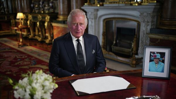 Britain's King Charles III delivers his address to the nation and the Commonwealth from Buckingham Palace, London, Friday, Sept. 9, 2022, following the death of Queen Elizabeth II on Thursday - Sputnik International