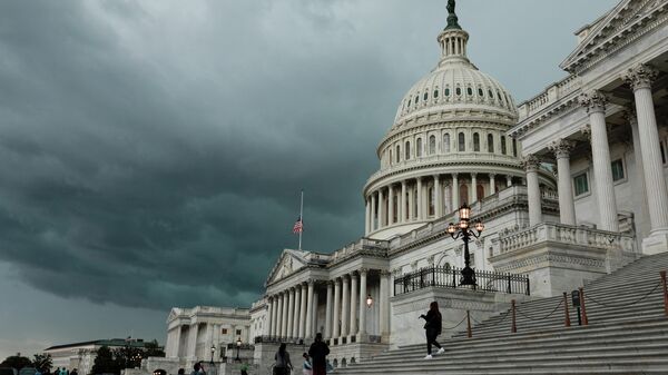 A storm cloud hangs over the U.S. Capitol Building on May 16, 2022 in Washington, DC - Sputnik International