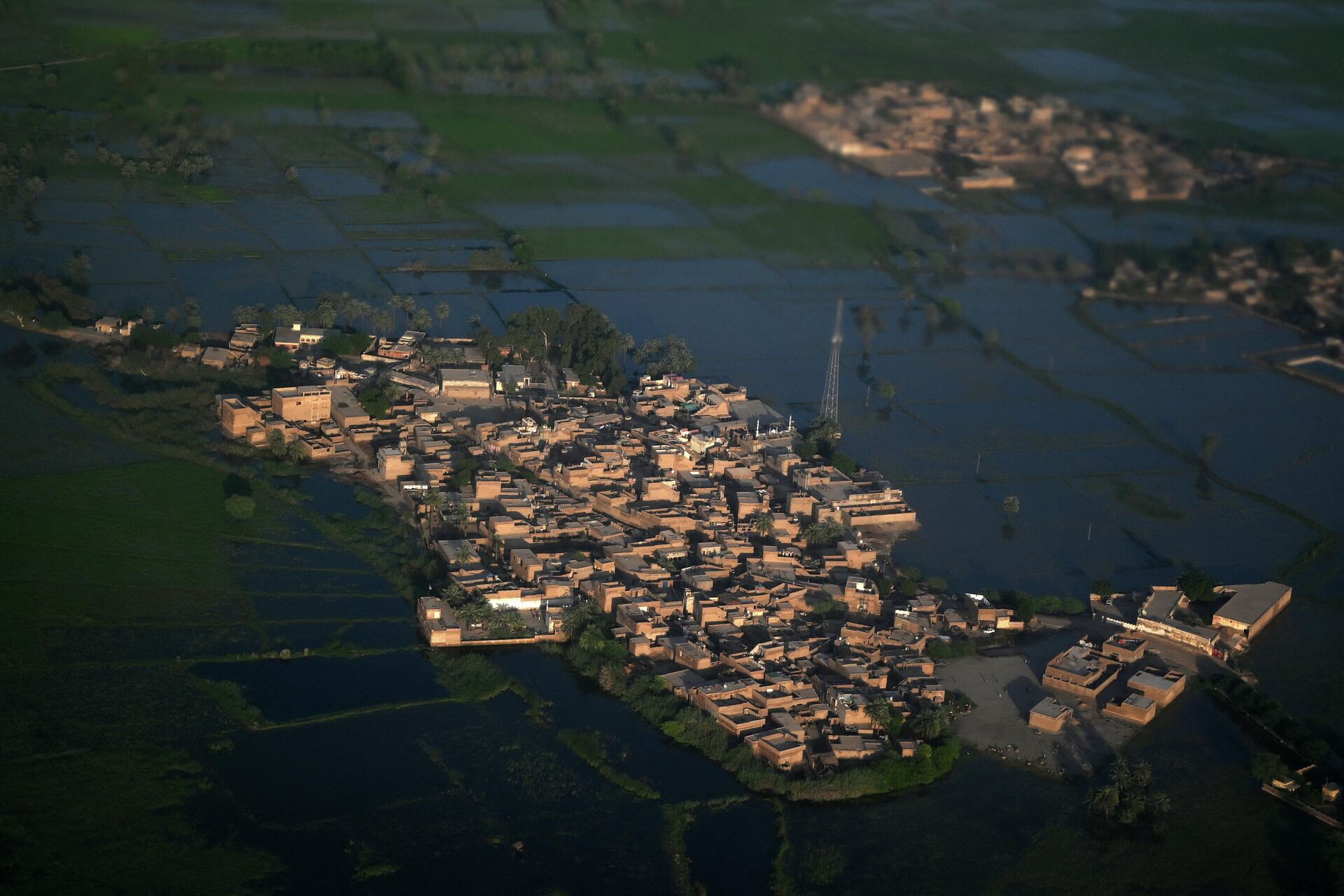 This aerial photograph shows a flooded area on the outskirts of Sukkur, Sindh province, on September 9, 2022 - Sputnik International, 1920, 15.09.2022
