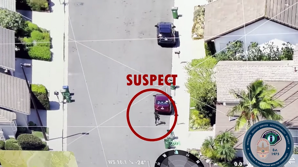 Image depicts usage of drone technology by California's Irvine Police Department to track down a wanted suspect. Drone usage in such cases has seen a rise across US police departments over the last several years. - Sputnik International