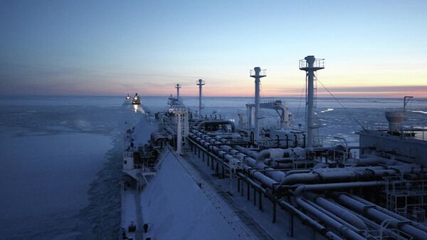 A handout photo provided by Russian gas giant Gazprom press service and taken on November 15, 2012, shows the Ob River tanker able to carry liquified natural gas (LNG) sailing somewhere in the undisclosed location in the Arctic - Sputnik International