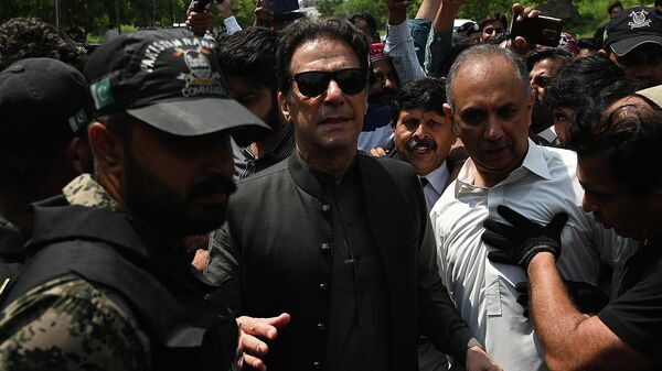 Former Pakistani prime minister Imran Khan (C) arrives to appear before the Anti-Terrorism Court in Islamabad on September 1, 2022. - Sputnik International