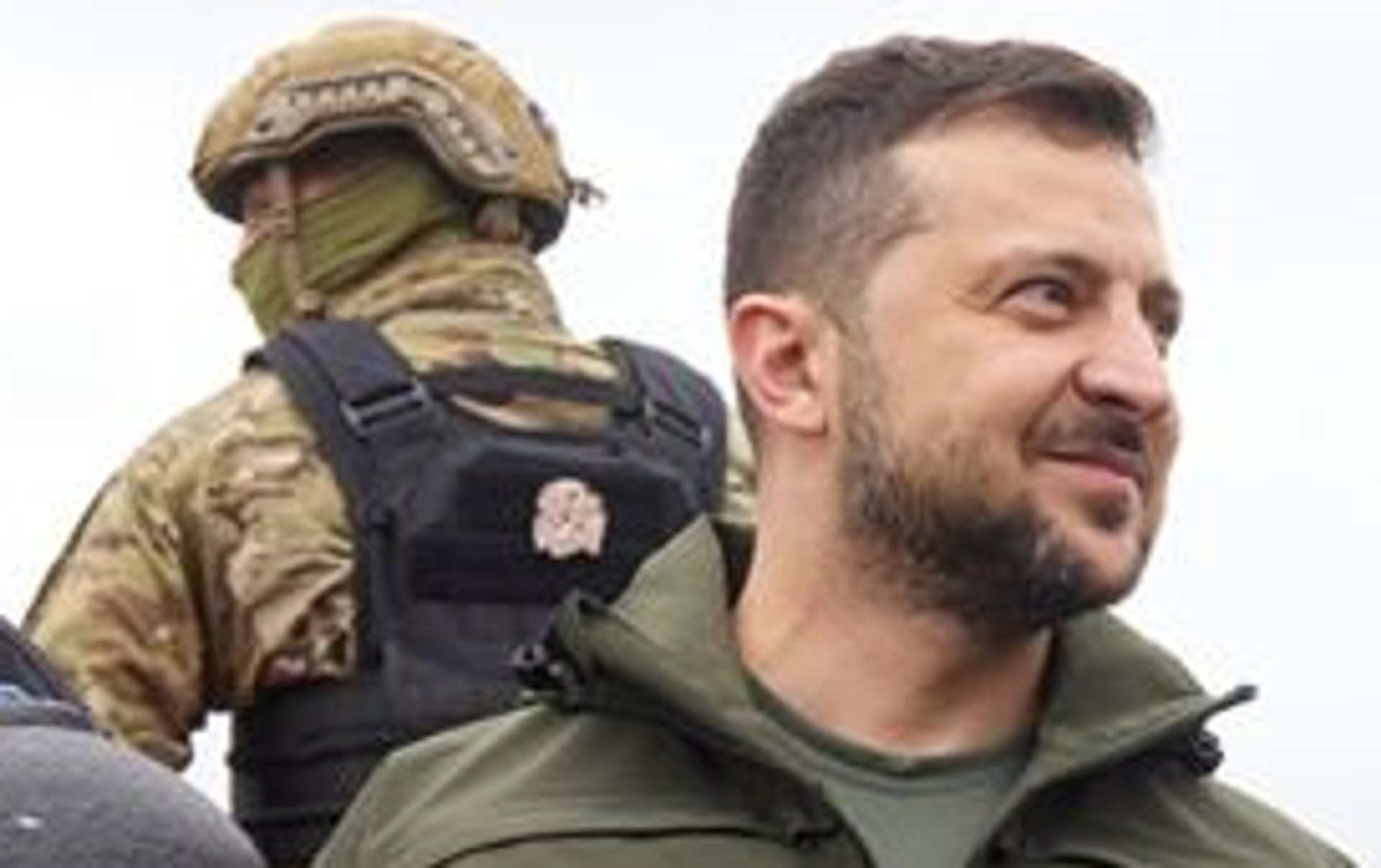 Zoomed in image of trooper with an SS-Totenkopf patch on his bodyarmor behind President Volodymyr Zelensky during the latter's visit to eastern Ukraine. - Sputnik International, 1920, 14.09.2022