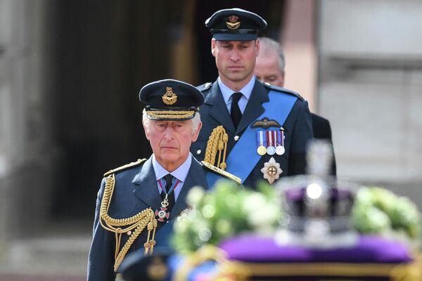 Britain&#x27;s King Charles III and Prince William, Prince of Wales walk behind the coffin of Queen Elizabeth II, during  a procession from Buckingham Palace to Westminster Hall in London, Wednesday, Sept. 14, 2022. The Queen will lie in state in Westminster Hall for four full days before her funeral on Monday Sept. 19. - Sputnik International