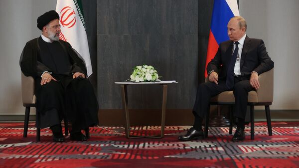 Russian President Vladimir Putin and Iranian President Ebrahim Raisi at the Shanghai Cooperation Summit in Samarkand, Thursday September 15, 2022. - Sputnik International