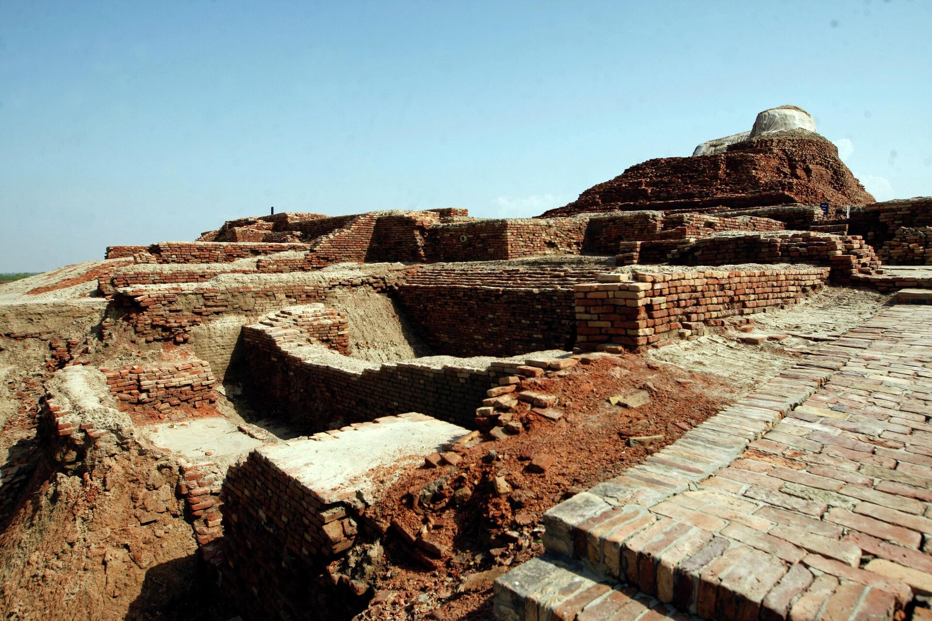 Ruins at Mohenjo Daro, a UNESCO World Heritage Site, in Mohenjo Daro, suffered damage from heavy rainfall, in Larkana District, of Sindh, Pakistan, Tuesday, Sept. 6, 2022. The rains now threaten the famed archeological site dating back 4,500 years.  - Sputnik International, 1920, 15.09.2022