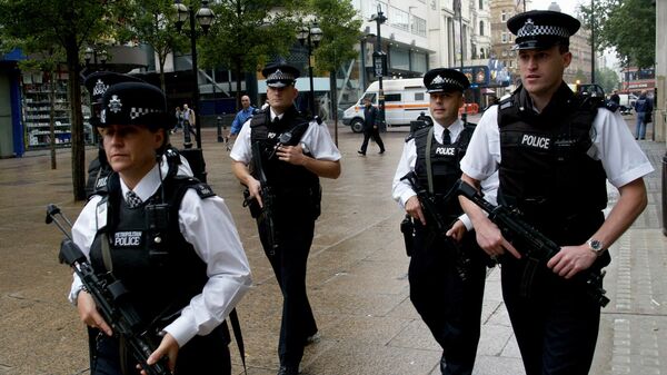 Armed British police patrol London's Leicester Square (File) - Sputnik International