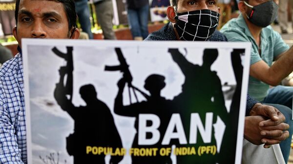 India's ruling Bharatiya Janata Party (BJP) supporters and activists take part in a protest demanding ban on Popular Front of India (PFI) organisation in New Delhi on February 28, 2021. - Sputnik International