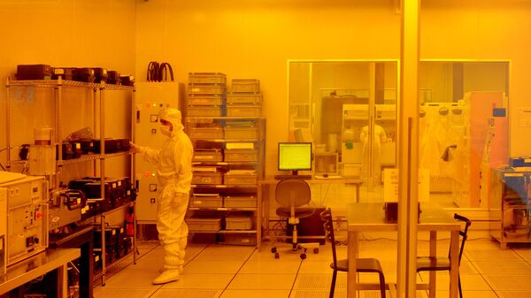 Researchers wearing bunny suits work inside the semiconductor fabrication lab at the Centre for Nano Science and Engineering (CENSe), situated at the Indian Institute of Science (IISc), in Bangalore on June 30, 2018 - Sputnik International